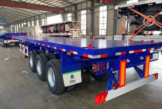50 τόνους 3 άξονες Κωνσταντίνος Τροχόφορο Flatbed Semi Trailers με Q345B Χάλυβα ωφέλιμο φορτίο εξατομικευμένο