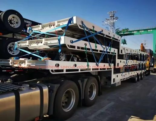 40-100 τόνων ωφέλιμο φορτίο Μηχανοκίνητη ανάρτηση 40ft χαμηλό κρεβάτι ημιτελόνι με ελαστικό 12R22.5