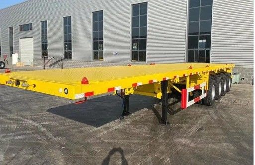 Τροχαίο ρυμουλκούμενο 20ft 40ft επίπεδο κρεβάτι κοντέινερ ημιριμουλκούμενο με σύστημα πέδησης διπλής γραμμής