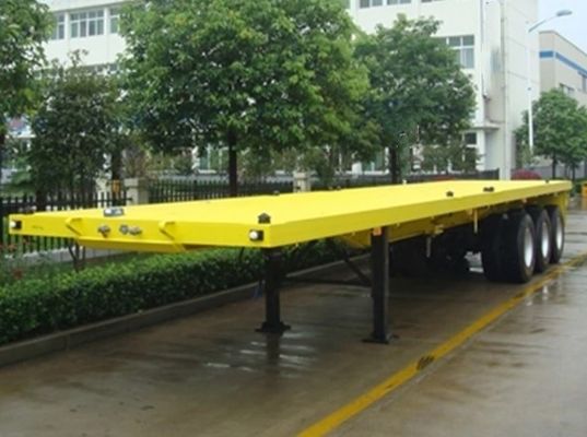 Q345b Κύρια δέσμη 3 άξονες 20ft 40ft Συσκευαστήρα Μεταφορά 60-100Tons επίπεδα κρεβάτια επίπεδα φορτηγά φορτηγά ημιπροκατασκευή